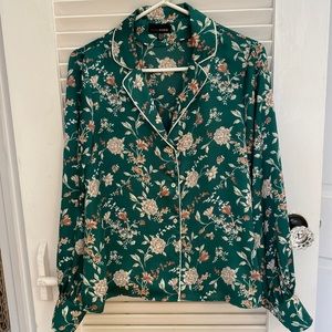 Vibrant green button down blouse with white pipping